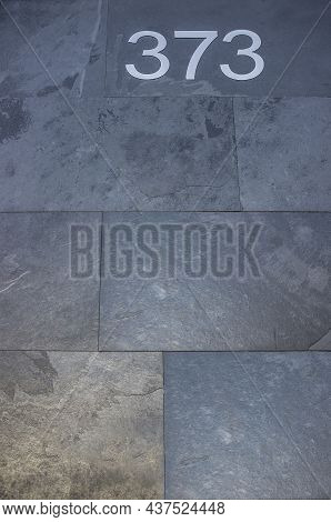 House Number 373. Silver Over Black-blueish Slate. Houses With Personality Concept