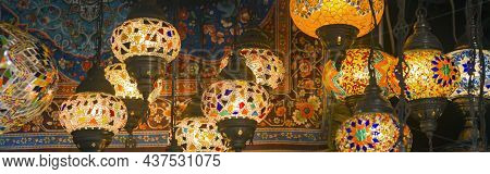 Middle Eastern Lambas Of Different Colors And Sizes Are Hanging In The Bazaar. Bright Traditional Ar