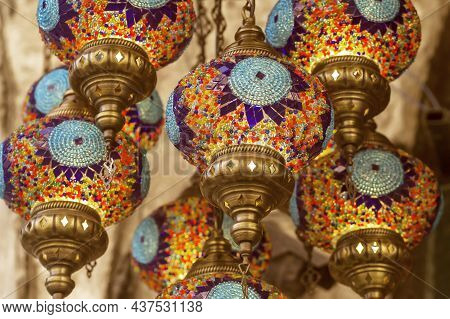 Middle Eastern Lambas Of Different Colors And Sizes Are Hanging In The Bazaar. Bright Traditional Ar