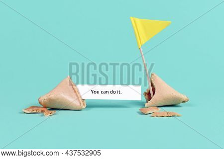 Fortune Cookie With Motivational Text Saying 'you Can Do It' With Flag On Teal Blue Background