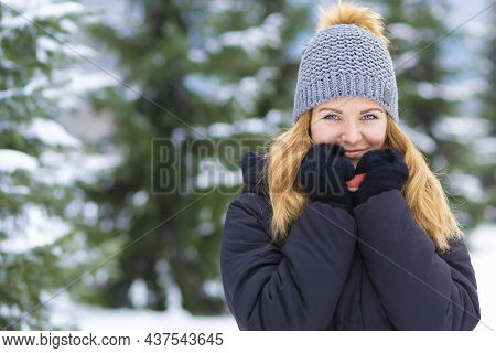 Portrait Beautiful Happy Girl Whitework Smile Teeth, Blue Eyes On Spruce Background In Frosty Day. A