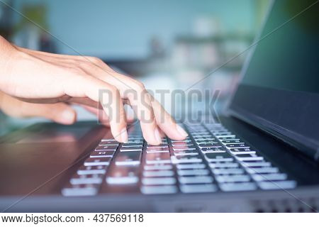 Data Theft Concept. Hacker Hand Typing Keyboard For Identity Theft Data From Computer Laptop