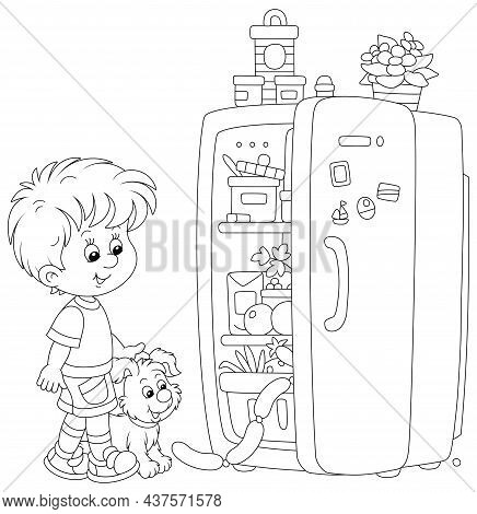 Little Boy And His Merry Puppy Looking Curiously Into A Home Fridge With Foods And Going To Filch So