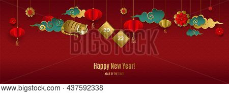 Happy Chinese New Year 2022 Banner With Hanging Golden Tiger, Clouds, Lanterns, Flowers On Red Backg