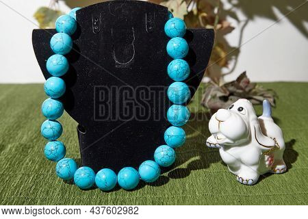 Beautiful Blue Beads. The Concept Of A Beautiful, Elegant Life And Beautiful Decoration For Woman
