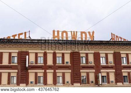 Forsyth, Montana - August 26, 2021: The Classic Rooftop Sign Of The Historical Howdy Hotel