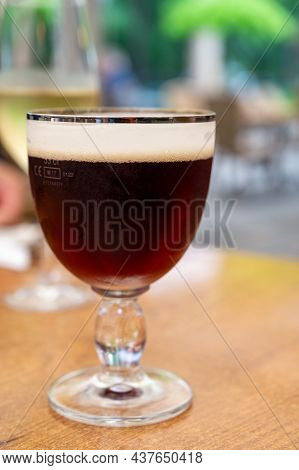 Glass Of Dark Tasty Belgian Dubbel Brown Beer From Abbey Brewery
