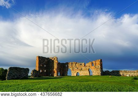 Ludza Medieval Castle Ruins On A Background Of Blue Sky And White Clouds