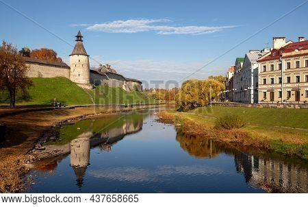 Pskov Autumn City Landscape. View Of The Walls And Towers Of The Kremlin With Reflection In The Psko