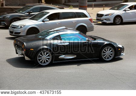 Kiev, Ukraine - June 19, 2021: Spyker C8 Laviolette. Black Luxury Supercar Spyker On The Road