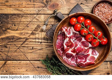 Italian Sliced Cured Coppa Ham With . Wooden Background. Top View. Copy Space