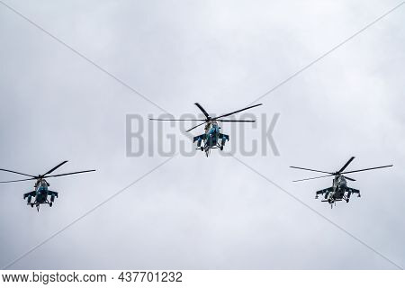 Moscow, Russia - May, 09, 2021: Mi-35m Attack Helicopters In The Sky Over Moscow During The Parade D