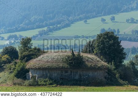 Massive Air Raid Shelter From The Second World War For Border Defense On Green Field