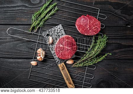 Grill Bbq - Raw Fillet Mignon Beef Steaks With Herbs. Black Wooden Background. Top View