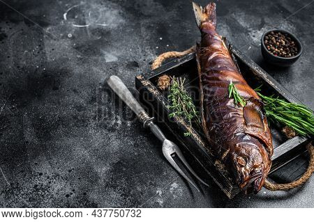 Hot Smoked Pike Perch Or Zander Fish In A Wooden Tray. Black Background. Top View. Copy Space