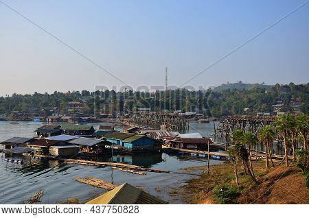 View Landscape Floating Village And Rafts Hotel Resort With Saphan Mon Or Uttamanusorn Bridge For Th