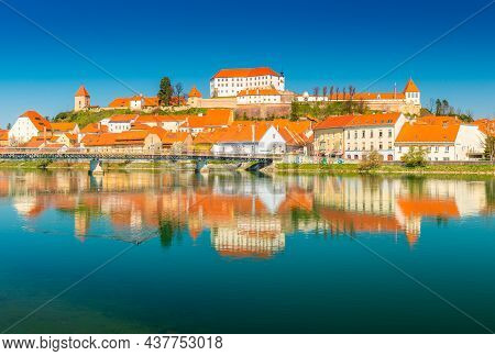 Ptuj - March 2021, Slovenia: Beautiful View Of The Ancient Slovenian Town Of Ptuj Reflected In The W