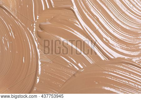 Close Up Brown Background Of Liquid Foundation