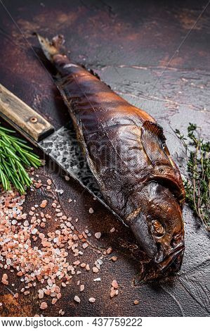 Hot Smoked Fish Walleye Or Pike Perch On A Wooden Board With Herbs. Dark Background. Top View