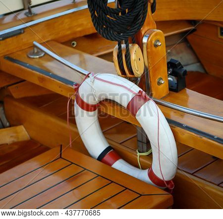 Details Of A Sailboat. A Sailboat With A Hull Made Of The Finest Machined Wood.