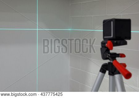 Cross Lines Of Laser Level On White Walls