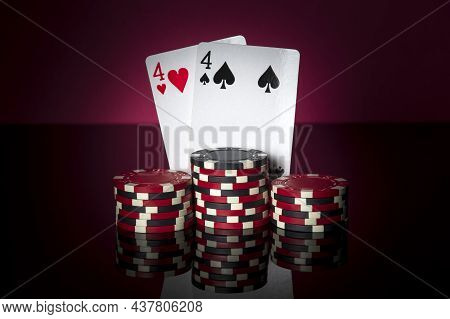 Poker Game With One Pairs Combination. Chips And Cards On Red Table. Successful And Win