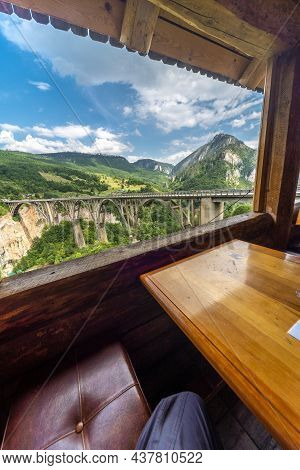 View Of Tara Canyon Bridge Through Log Cabin Window,durmitor National Park,montenegro.