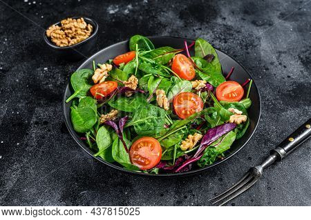 Vegetarian Salad With Mix Leaves Mangold, Swiss Chard, Spinach, Arugula And Nuts In A Salad Bowl. Bl