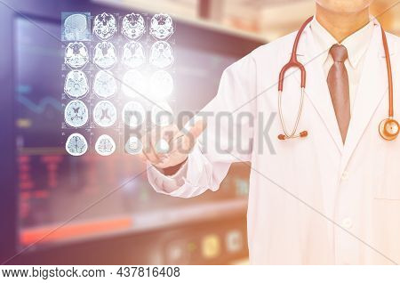 Radiologist Doctor Touching Film Brain Mri At Hospital.