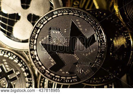 Horizontal View Of Cryptocurrency Tokens Including Monero Xmr, Bitcoin, Riddle, Seen From Above On A