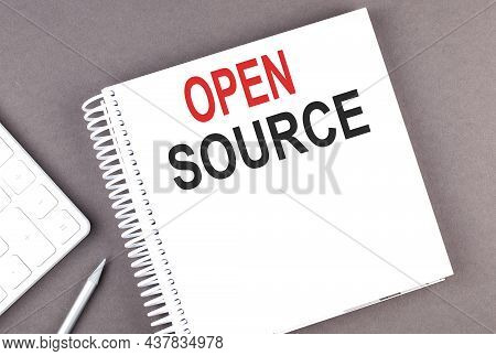 Open Source Text On Notebook With Calculator And Pen,business