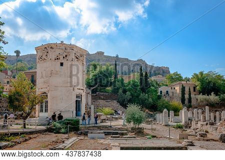Athens, Greece - October 11 2021: View Of The Roman Agora With The Acropolis In The Background. The 