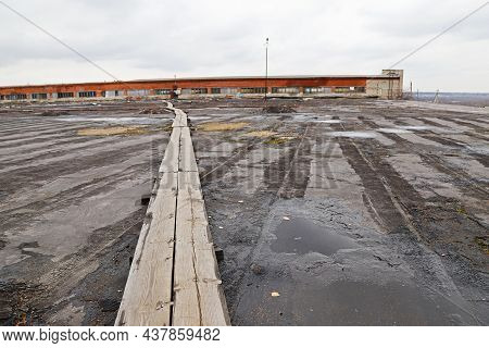 Old Wooden Walkway Made Of Thin Long Boards
