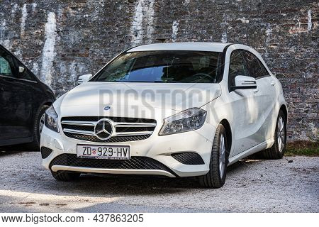 Zadar, Croatia - July 29, 2021: White Mercedes B-class In A Parking Lot In The City Of Zadar, Croati