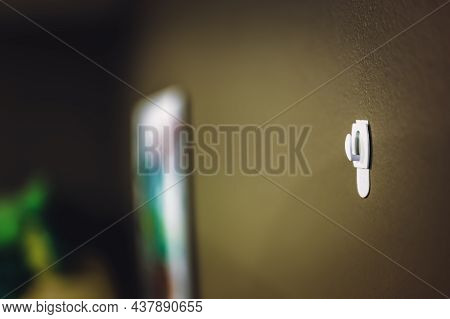 Selective Focus On Adhesive Strip Wall Hanger That Can Be Removed By Pulling Tape