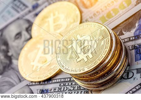 Golden Bitcoin Lies On The Banknotes.new Virtual Money. Crypto Currency Top View. Real Coins Of Bitc