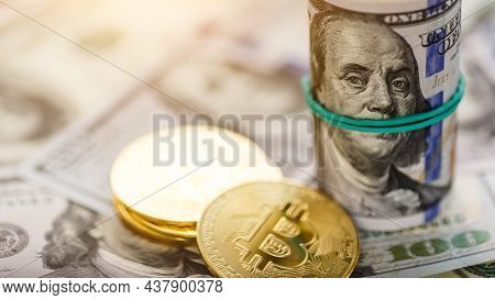 Golden Bitcoin Lies On The Banknotes.new Virtual Money. Crypto Currency Top View. Real Coins Of Bitc