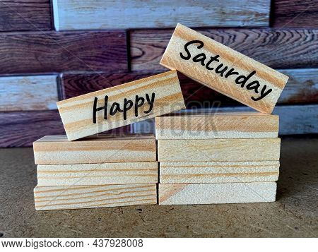 Happy Saturday Text On Wooden Bricks With Nice Writing