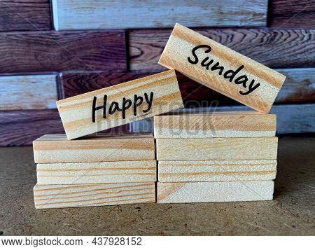 Happy Sunday Text On Wooden Bricks With Nice Writing
