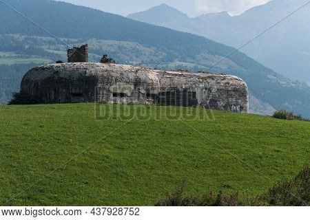 Massive Air Raid Shelter From The Second World War For Border Defense On Green Field