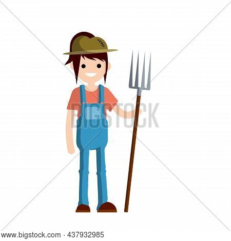 Man Farmer In Overalls With Fork In Hands. Rural Type Of Work. Production Of Natural Food In The Vil
