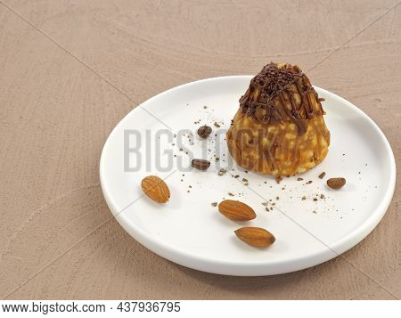 Cookies With Honey And Chocolate Chips. Nuts Are Almonds. Gourmet Cookies. On A White Saucer. Close-