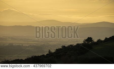 Beautiful Landscape Sunset Image Of Snowdonia National Park Mountains Viewed From The Hills Above Pr