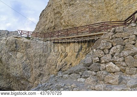Pedestrian Bridge On The Destroyed Area Of The Tourist Trail. Cape Alchak, Sudak, Crimea.