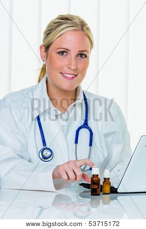 a young doctor at the surgery in their medical practice.