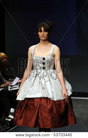 ZAGREB, CROATIA - NOVEMBER 07: Fashion model wearing clothes designed by Mitak and Gregl on the Fashion Wardrobe show on November 07, 2013 in Zagreb, Croatia.