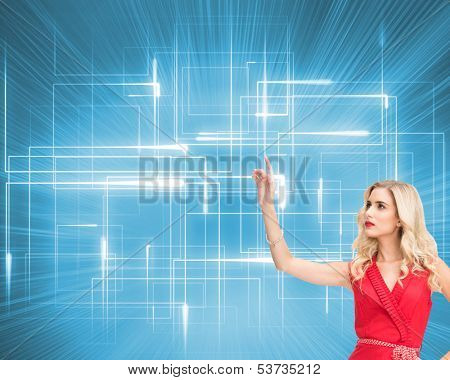 Composite image of elegant blonde standing pointing in red dress