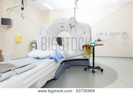 Interior of empty CT scan room in hospital