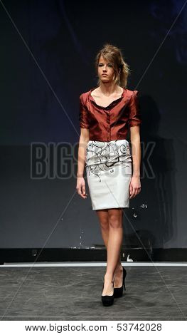ZAGREB, CROATIA - NOVEMBER 07: Fashion model wearing clothes designed by Mitak and Gregl on the Fashion Wardrobe show on November 07, 2013 in Zagreb, Croatia.