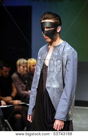 ZAGREB, CROATIA - NOVEMBER 07: Fashion model wearing clothes designed by Marko Sabo on the Fashion Wardrobe show on November 07, 2013 in Zagreb, Croatia.